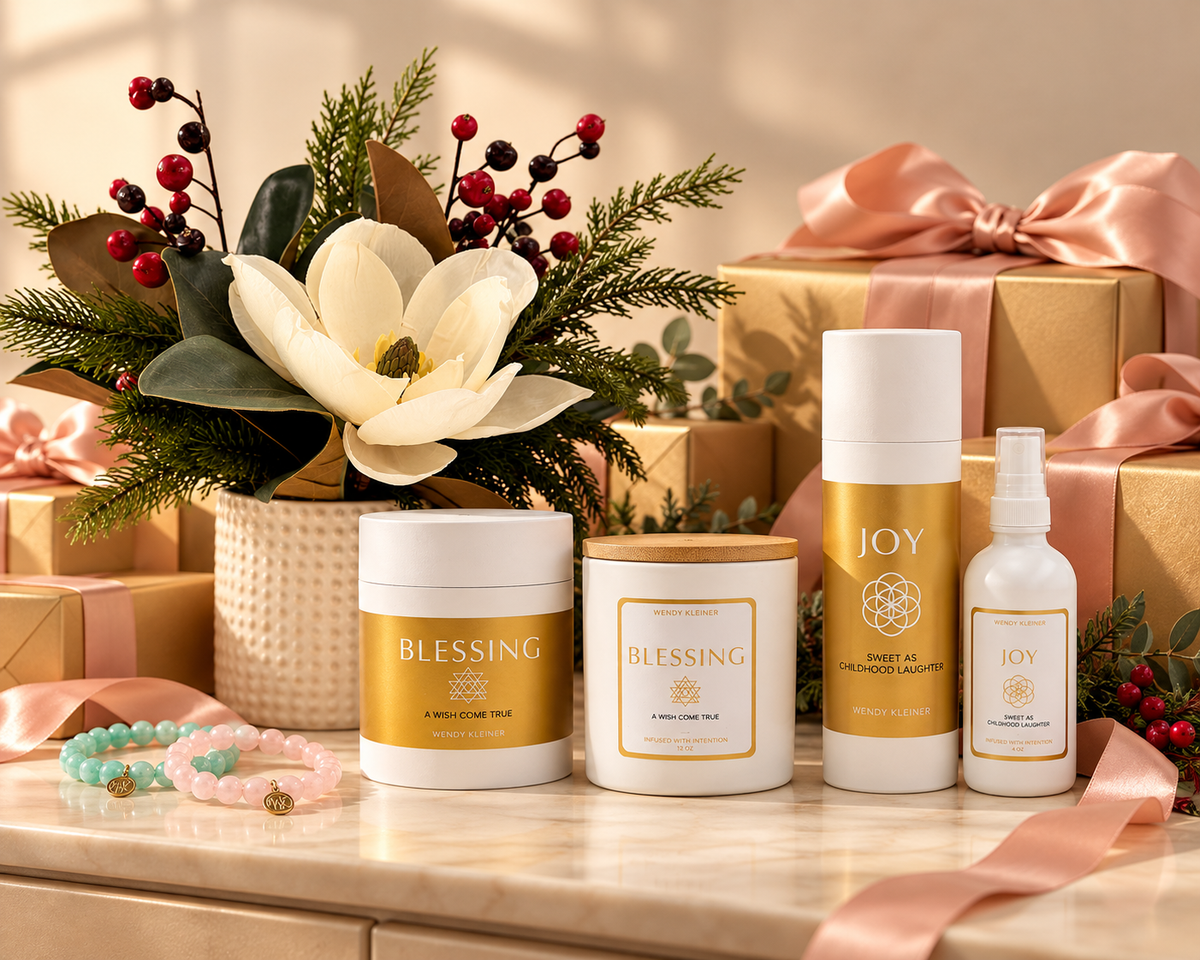 LOVEJOYNOW holiday gift set with candles, room spray, bracelets and a holiday floral arrangement